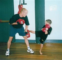 The Kids learn how to use their hands, legs, knees and elbows to defend themselves