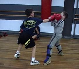 In the Stand up range the kids will spar in KickBoxing and Clinching ranges