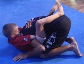 The Kids do sparring in various environments/ranges including submission wrestling. This is the way they test their techniques against resisting opponents